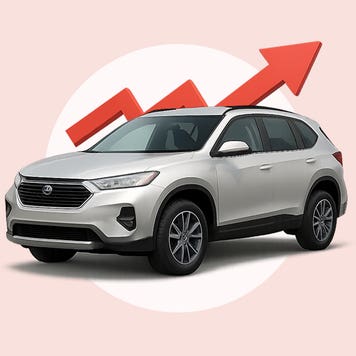 A silver SUV with an arrow going up and to the right behind it.