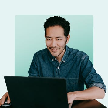 Man sitting at a computer