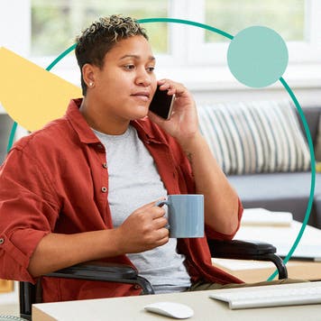 design image of an African American woman in wheelchair talking on phone at home