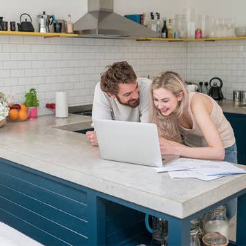 couple viewing credit card offers