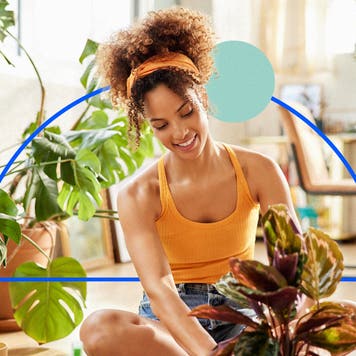 Woman watering plants.