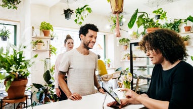 Man Ordering At Quirky Café Counter