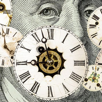 Clocks are displayed across an image of a dollar bill.