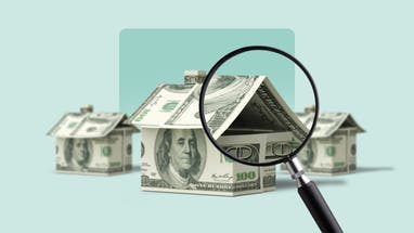 A house made of money, being looked at under a microscope.