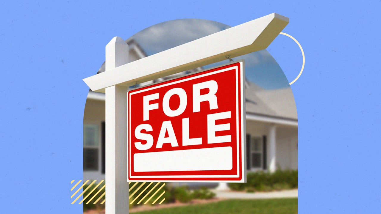 A large "for sale" sign