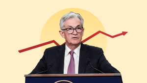 Jerome Powell in front of interest rate graphic
