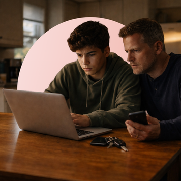 A father and son online shopping for auto insurance